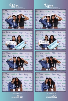 Photo booth photo strips of two young women holding signs.